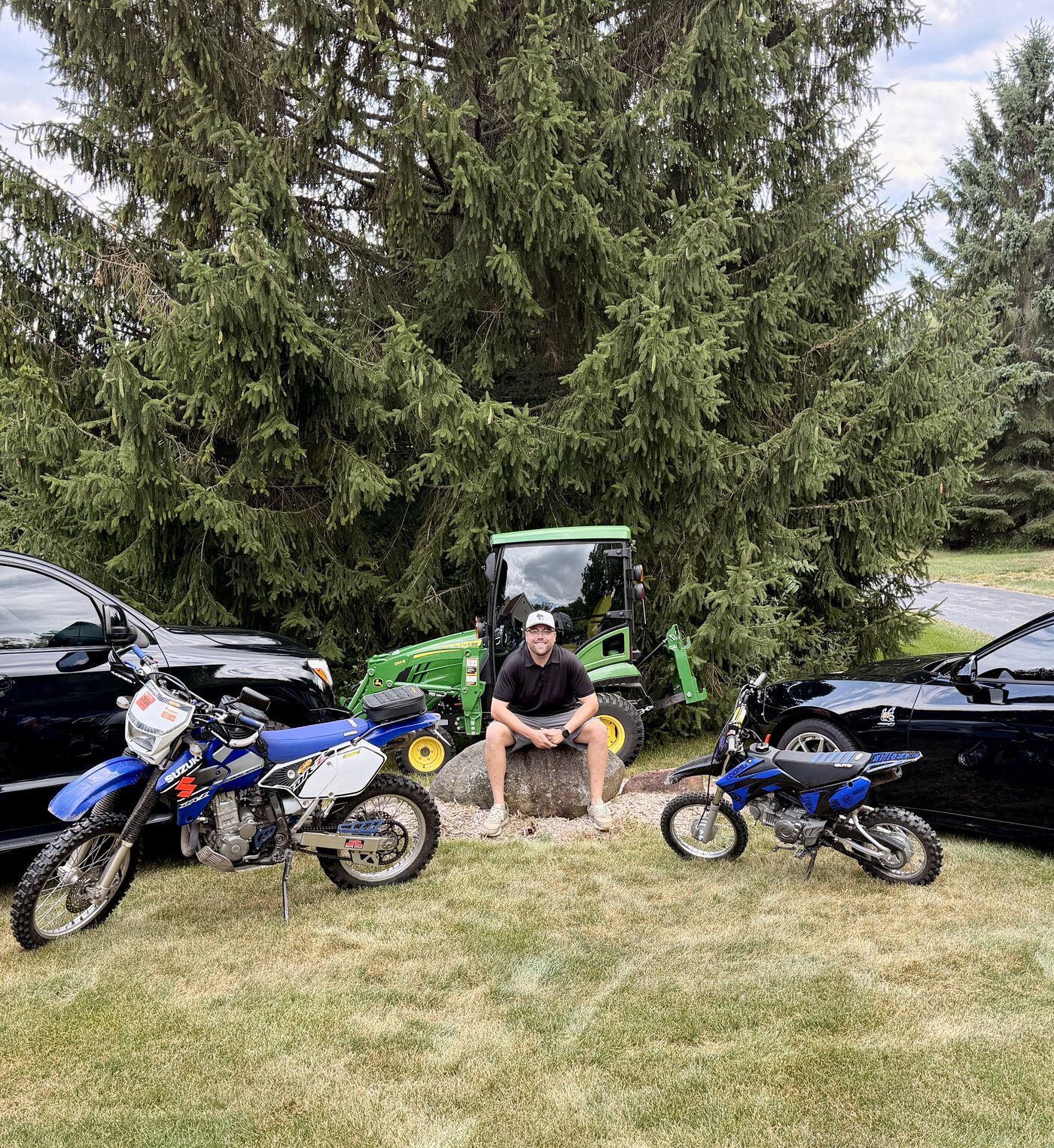 Kevin Michaels, founder, with some of his vehicles